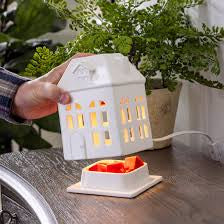 Porcelain house canopy illumination warmer