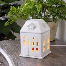 Porcelain house canopy illumination warmer